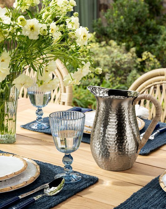 Hammered Stainless Steel Pitcher with Rattan Handle